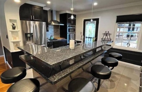 Rolando Village Villa | San Diego Villa with Huge Backyard, Hot Tub, Fire Pit, Grill, Outdoor TV & Bar