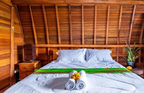 Kintamani Lit Et Petit-Déjeuner | Sandan Agsro Resort Bungalow Kamar Kayu