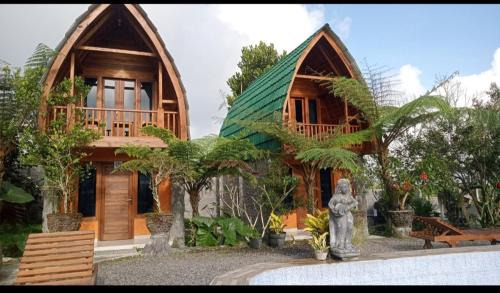 Kintamani Lit Et Petit-Déjeuner | Sandan Agsro Resort Bungalow Kamar Kayu