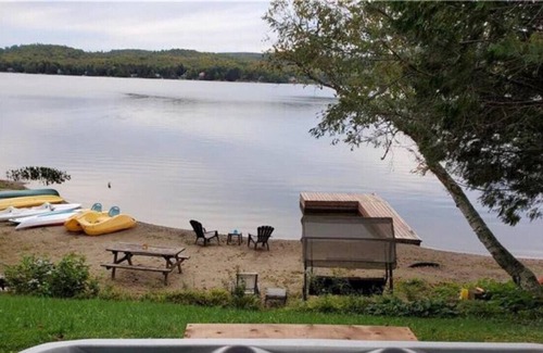 Amherst Maison | Sandy beach with spa and fire pit