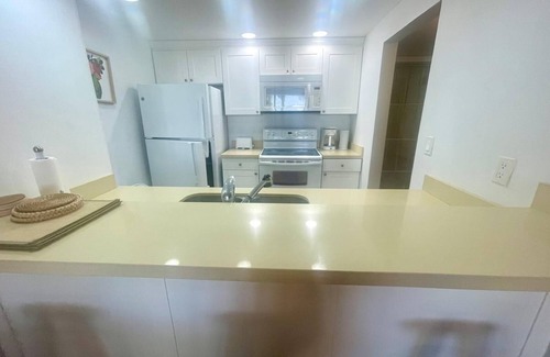 Windsor Park Copropriété | Sandy Beach within minutes from your private garden patio