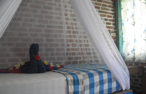 Tigawasa Lit Et Petit-Déjeuner | Santhika Bed and Breakfast Chambre familiale