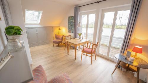 Altharlingersiel Appartement | Schillhörn - Urlaub mit Wasserblick