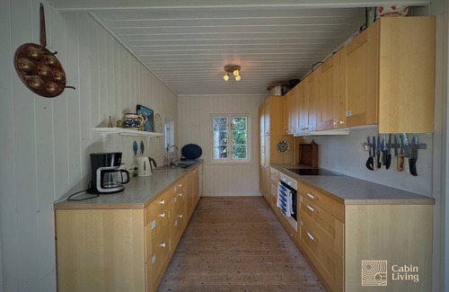 Kragero Cabine | Seaside cabin with boat and beach in Kragerø