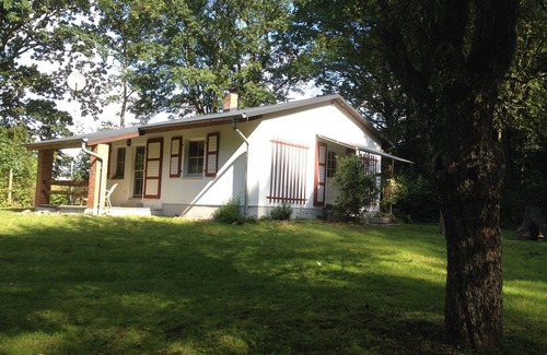 Pampow Maison | Bungalow à Forsthaus Thursee, 1 chambre, salon avec canapé-lit
