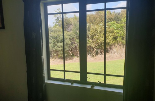 Tuateawa Cottage | Secluded Cottage in bush and garden setting and close to the sea
