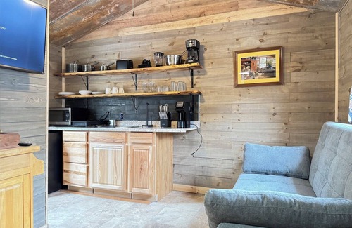 Tie Plant Cabine | Secluded one bedroom cabin with large deck overlooking a wooded gully.