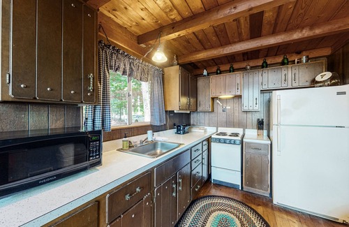 Parsonsfield Maison | Secluded waterfront cabin with private dock, kayak, canoe, gas grill & deck