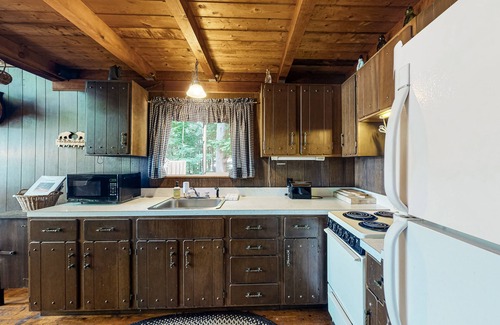 Parsonsfield Maison | Secluded waterfront cabin with private dock, kayak, canoe, gas grill & deck