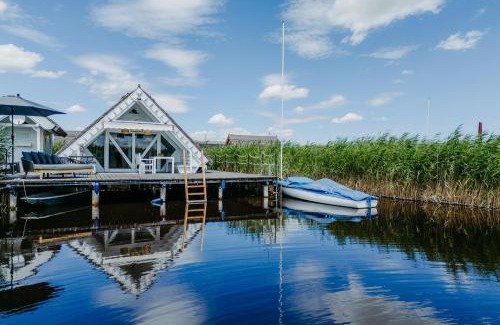 Rust Maison | Seehütte Neusiedlersee - Seehaus inklusive Elektroboot