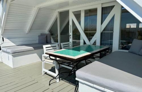 Rust Chalet De Ski | Seehütte Neusiedlersee - Strandhaus, Elektroboot inklusive