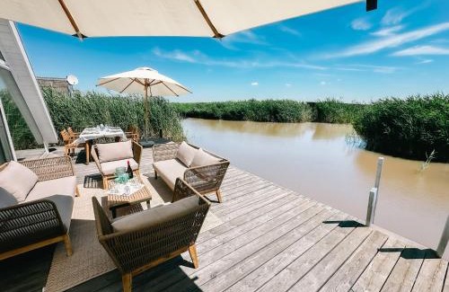 Rust Maison | Seehütte Sonnenschilf - Premium Hide-Away Ferienhaus in Rust direkt am Neusiedlersee
