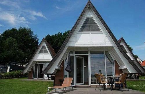 Bad Kleinen Maison | Seeperle 11 mit Ruderboot - ABC211
