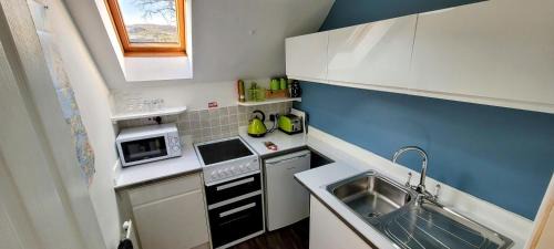 Balmacara Appartement | Self catering upper floor flat at Woodend house