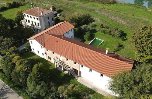 San Giorgio di Livenza Appartement | Envoyer Appartement 100m², rez-de-chaussée, avec piscine, location de bateaux