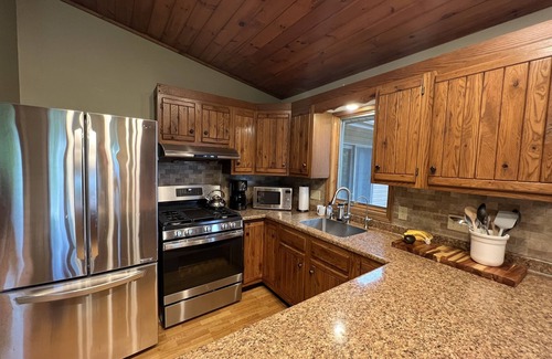 Himrod Maison | Seneca Lake View Retreat sits secluded on a 2 acre lot.