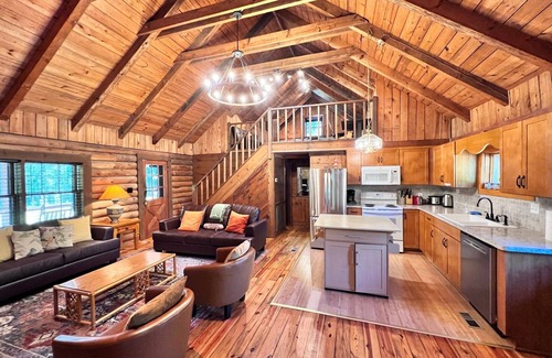 Apex Maison | Serene Log Home w pond, fenced-in yard & pastures