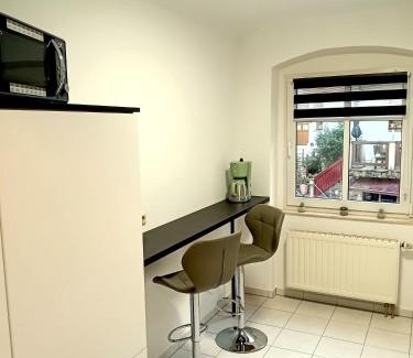 Niederrathen Appartement | Seyfarthrooms - Ferienwohnung Zum Dorfladen Rathen - zentrale Lage mit direkter Anbindung an das Wanderwegenetz, moderne Inneneinrichtung