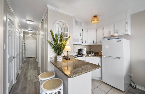 Galveston Copropriété | Shared pools and picnic BBQ grill area
