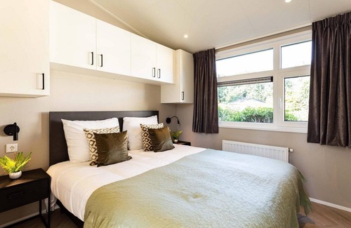 Ede Chalet De Ski | ✓ Silva at Bospark Ede ✓ Holiday home for 4 people ✓ Located in Ede (Gelderland) ✓ Holiday resort in the Veluwe region ✓ Book directly at the resort
