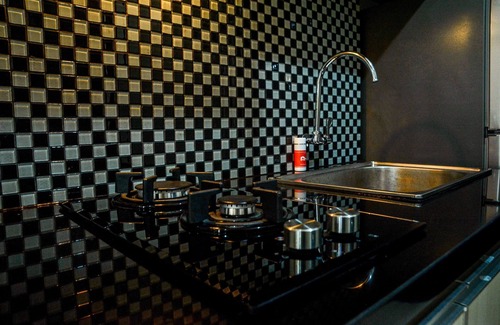 Panunggangan Utara Appartement | Simply Studio Room at Grand Serpong Apartment By Travelio