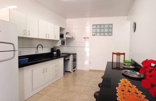 Capao da Canoa Maison | Maison individuelle sur le patio avec deux chambres et une connexion Wi-Fi à Capão Da Canoa