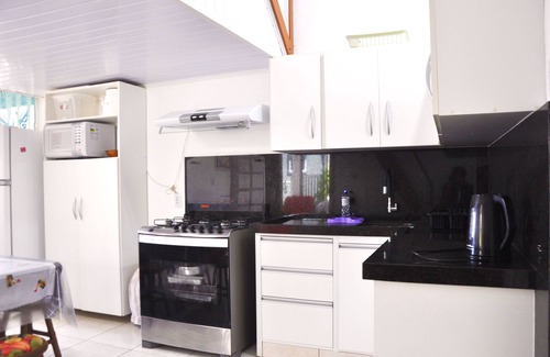 Capao da Canoa Maison | Maison individuelle sur le patio avec quatre chambres à coucher à Capão Da Canoa