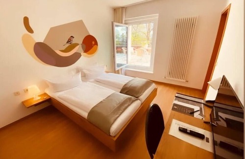 Ulm Hôtel | Chambre Simple-Budget-Salle de bain partagée
