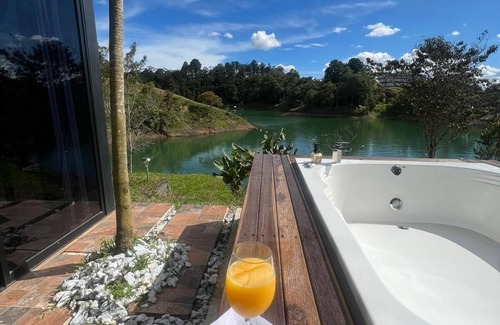 Guatape Cabine | SINPRISA "NOT RUSH "PRECIOUS CABIN! withJacuzzi, stone view, direct access to the reservoir