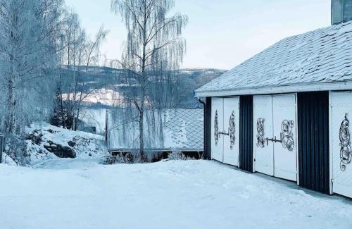 Hundorp Appartement | Sjarmerende tømmerhytte på gårdstun
