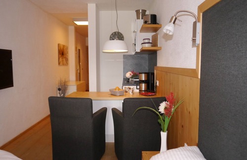 Schonbach Appartement | Skis aux pieds appartement pour 2 à droite sur la piste dans la station de ski de Kitzbühel Kirchberg