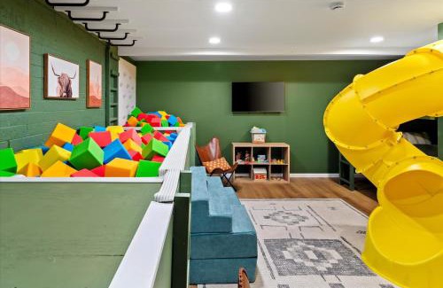 Copperwood Maison | Slide into Fun Pool Games Fire Pit Sport Court