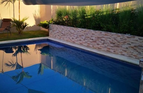 Esterillos Este Maison | Sloth house - Piscine communautaire.