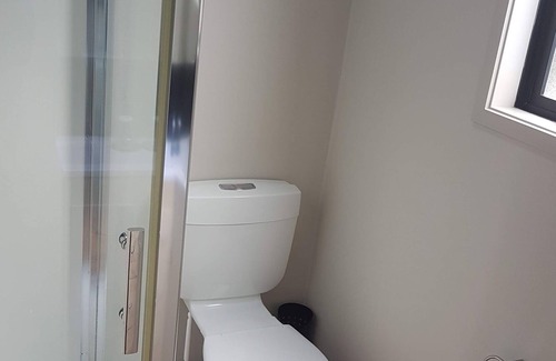 Waihi Beach Cottage | Cottage indépendant de 2 chambres en front de mer. Waihi Beach Paradise Resort.