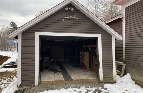 Patten Maison | Snowmobile trail access. Room for multi-vehicle/trailer parking.