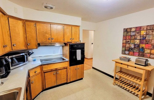 Columbus Maison | Solitude in the City! Beautiful home, easy access to all Columbus! 1/2 Acre Lot!