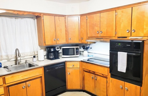Columbus Maison | Solitude in the City! Beautiful home, easy access to all Columbus! 1/2 Acre Lot!