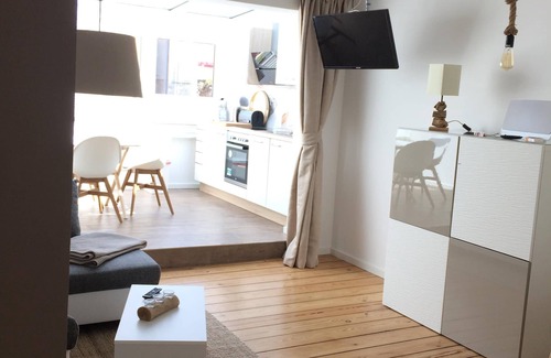 Warnemuende Appartement | « Voile solaire » Inside out: central comme il se - avec jardin d'hiver