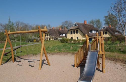 Puddemin Maison | Sonniges Reetdachhaus