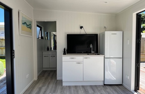 Pauanui Maison | La maison de plage classique - avec une touche moderne.