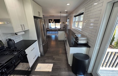 Manoa Maison | Spacious 4-bedroom house dual primary suites, updated, pets and kids friendly!