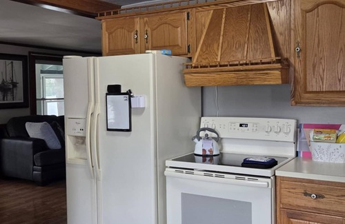 Alton Bay Maison | Spacious 4-bedroom house with, Private Beach, WiFi, AC in peaceful Alton