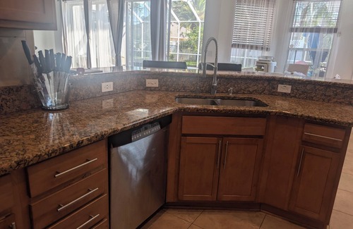 Indian Trails Maison | Spacious 4 BR house w/ Solar heated pool, Spa and Sauna in delightful Palm Coast