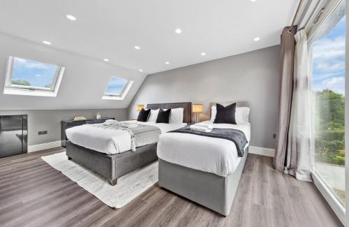 Luton Maison | Spacious 5BR for Work Crews Parking & WiFi
