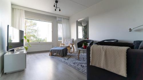 Jarvenpaa Appartement | Spacious 68m2 apartment with fabulous forest view and aircon