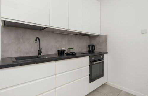 Piecki-Migowo Appartement | Spacious Apartment with Parking | Gym | Smart TV | Remote working | WiFi
