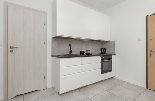 Piecki-Migowo Appartement | Spacious Apartment with Parking | Gym | Smart TV | Remote working | WiFi