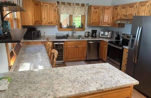 Farmington Maison | Spacious lakefront home with 5 bedrooms & hot tub!