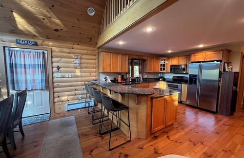East Wakefield Maison | Spacious Lakefront Log Home for Family Fun & Relaxation- deck, firepit, gameroom