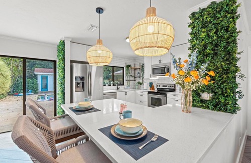 Lake Clarke Shores Maison | Spacious Palm Beach Paradise with Heated Pool and Backyard Games